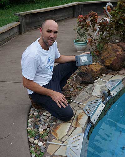 Michael Bruvel with his water cooling system for pools