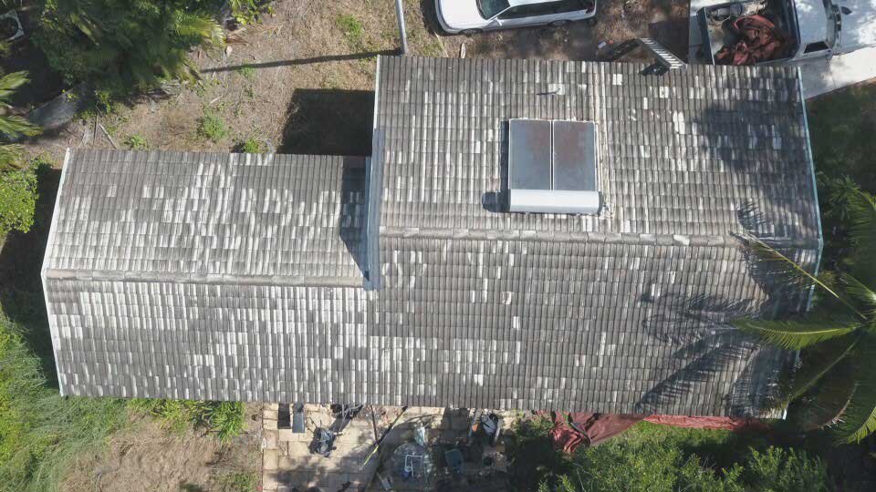 Shot of a damaged house roof before the repairs