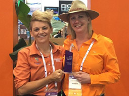Sammy Koulakis from Fusion Exhibition and Louise Kitchingham, NT Convention Bureau with the AIME 2018 Trophy