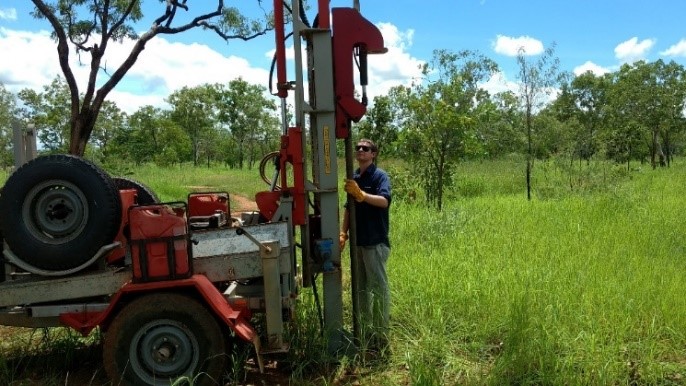 Image: Patric Burly demonstrating DENR’s hydraulic soil sampling drill 