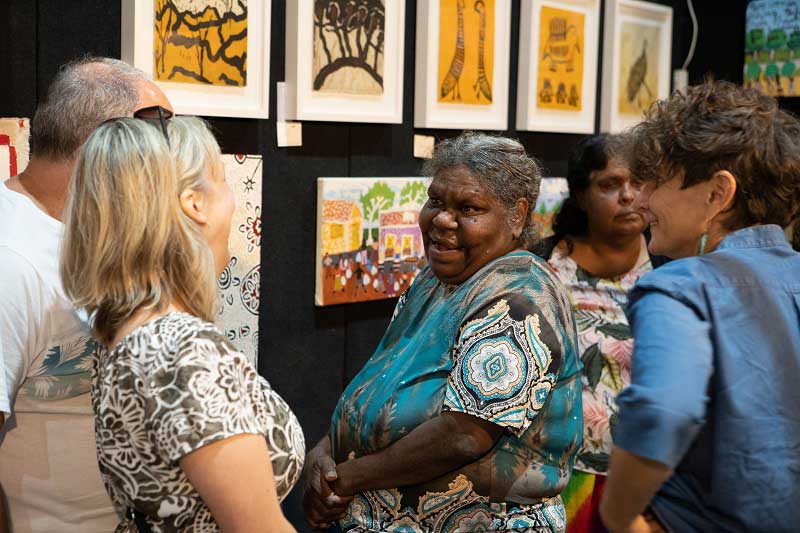 Artists and visitors to the Darwin Aboriginal Art Fair