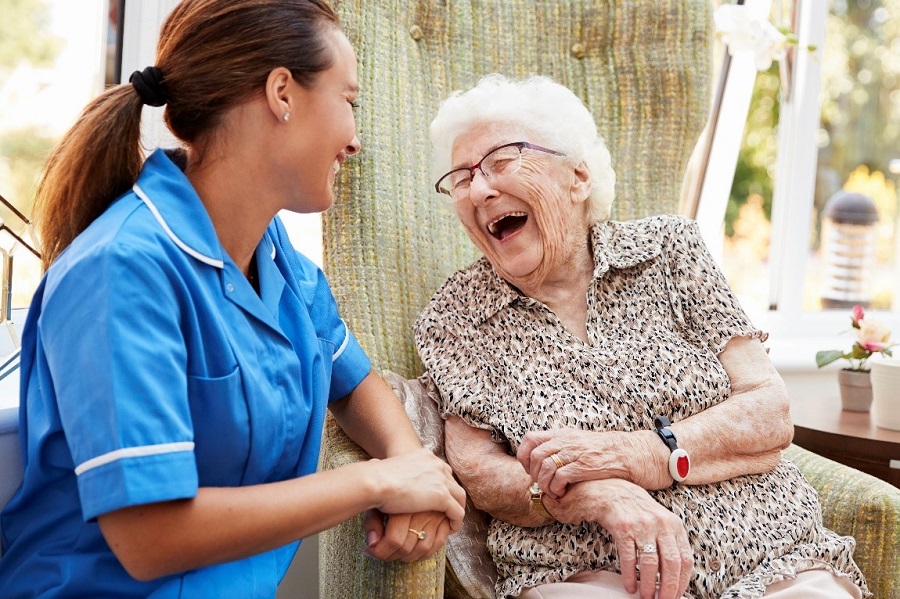 Aged care worker with a resident