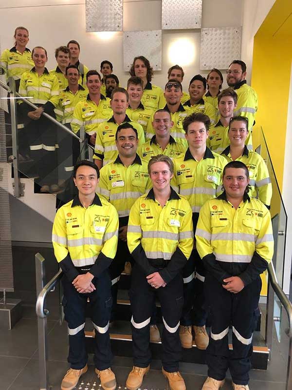 Group shot of Prelude to the Future apprentices standing on a staircase